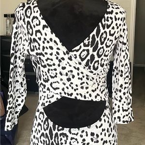 Arden B Zebra print dress with cut out.